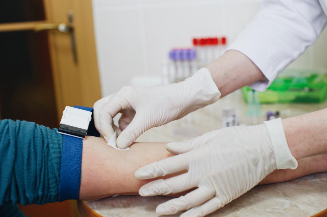 person preparing for blood test