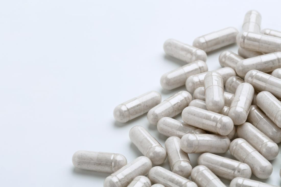 Probiotics in the form of powder in pill capsules piled up