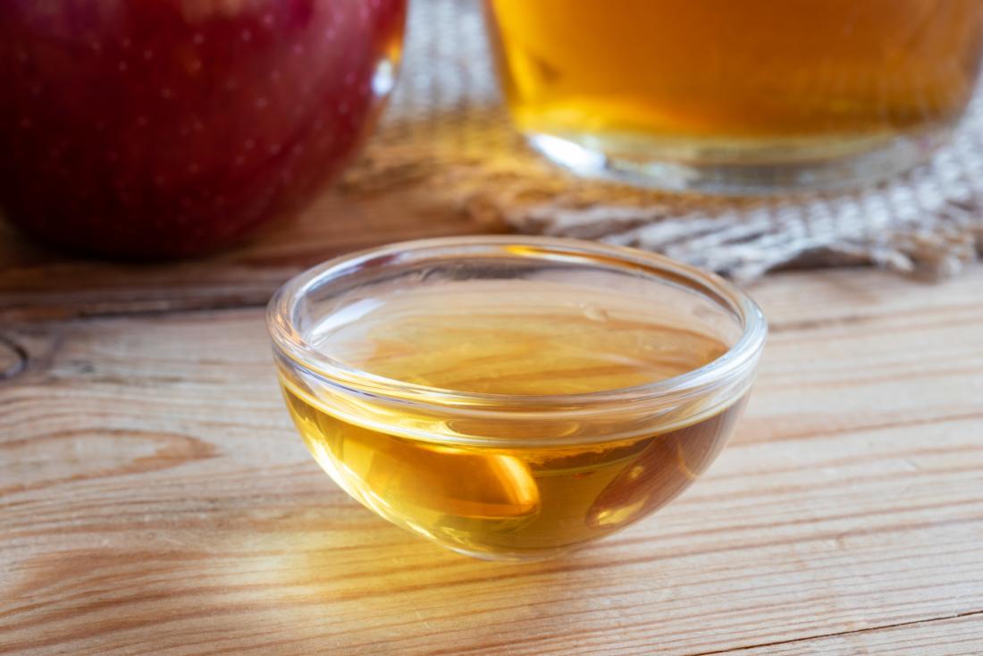 apple cider vinegar in small glass
