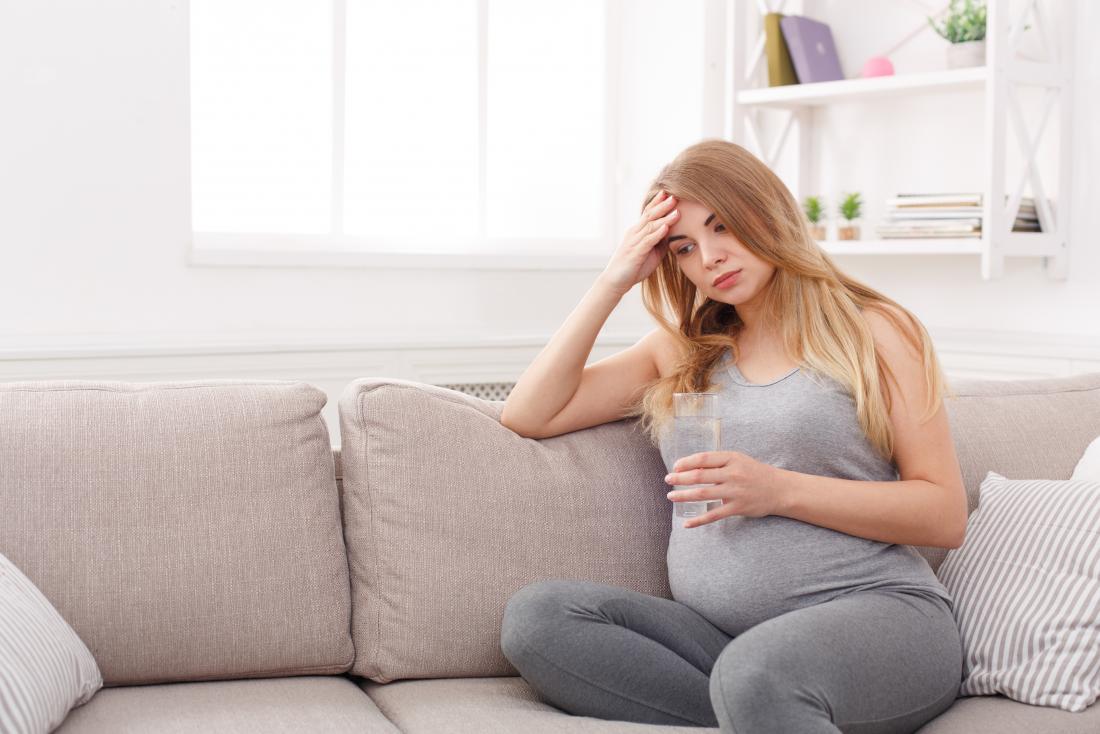 Pregnant woman with a headache