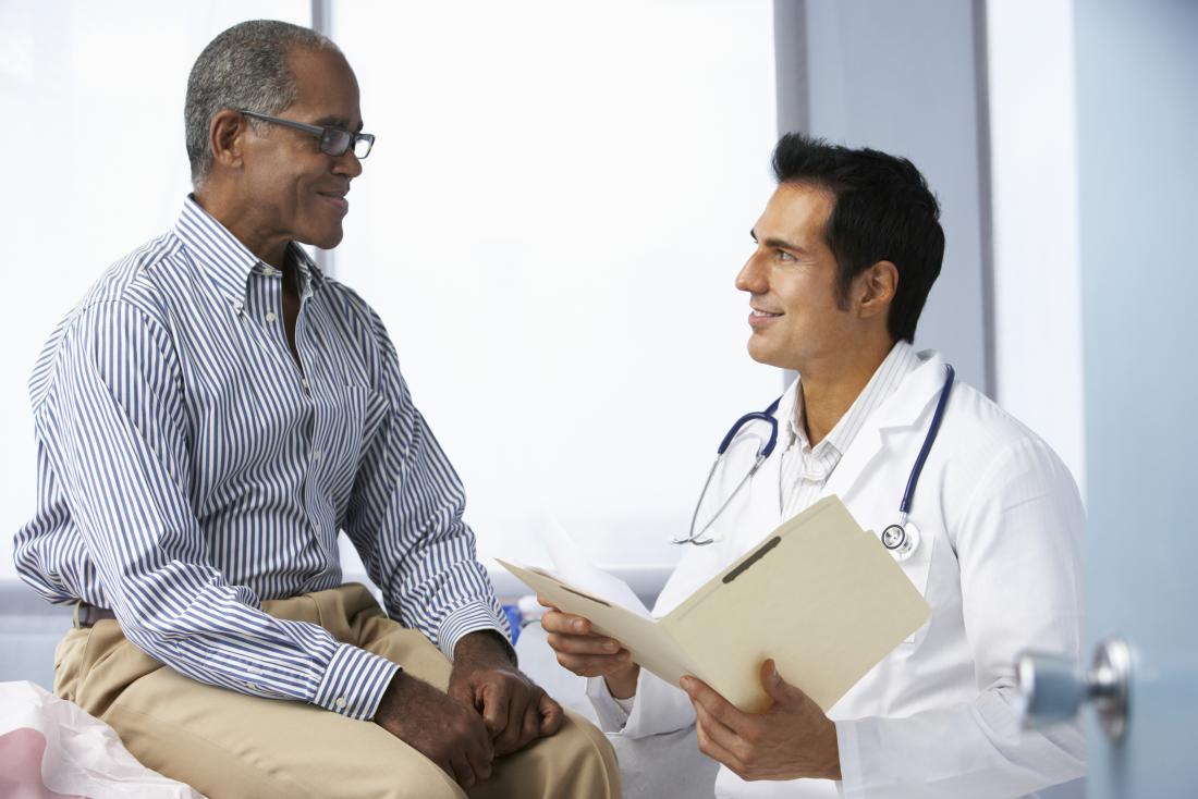 doctor discusses HIV with patient