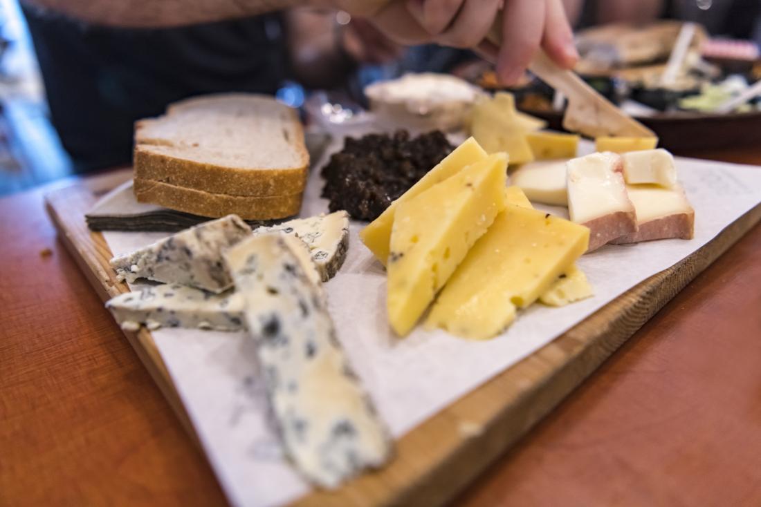 Various cheeses on a board which are part of hypothyroidism diet