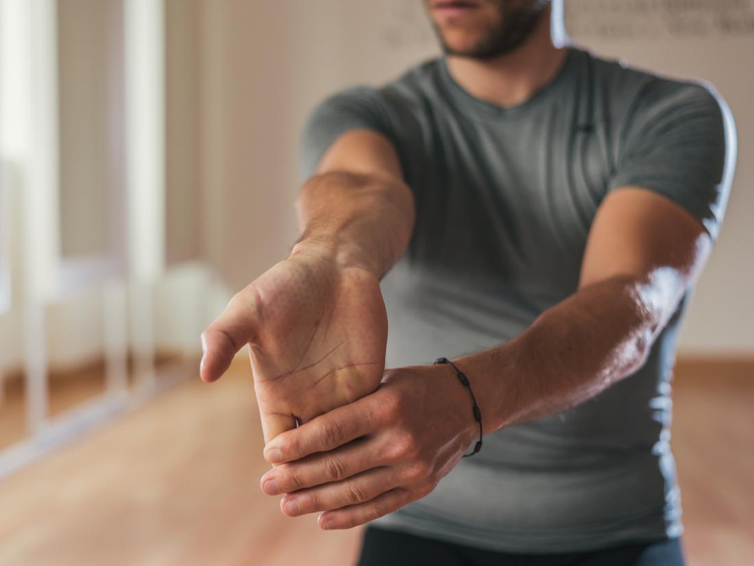 Stretching the wrists and arms can help to prevent swelling.