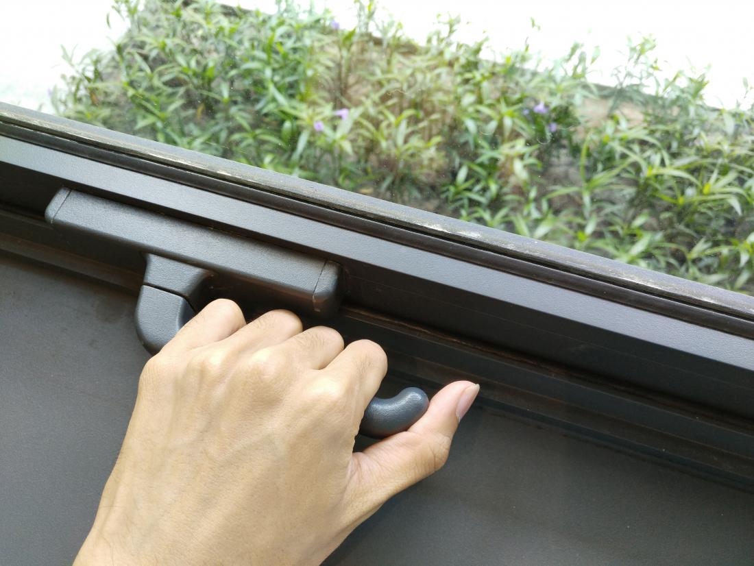 closing a window during pollen season