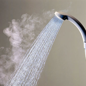 Humidified air from a hot shower can help soothe laryngitis symptoms.
