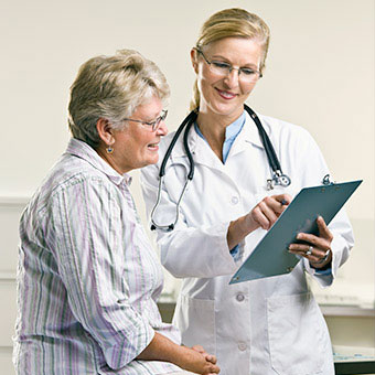 A woman consults with her doctor.