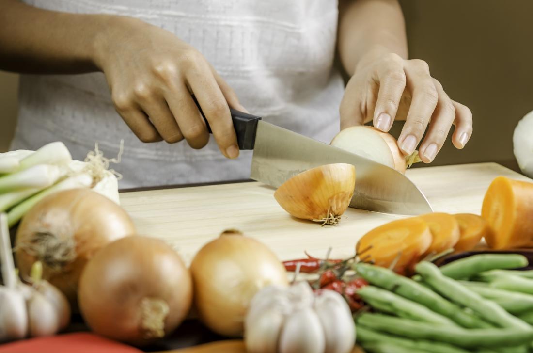 woman chopping onion