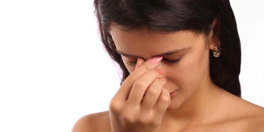 What is frontal sinusitis and what causes it?