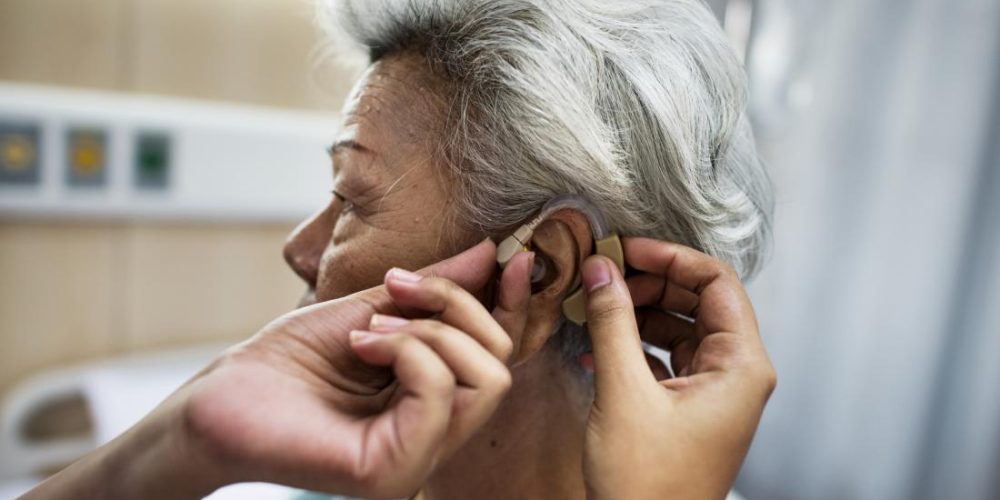How do hearing and sight influence cognitive decline?