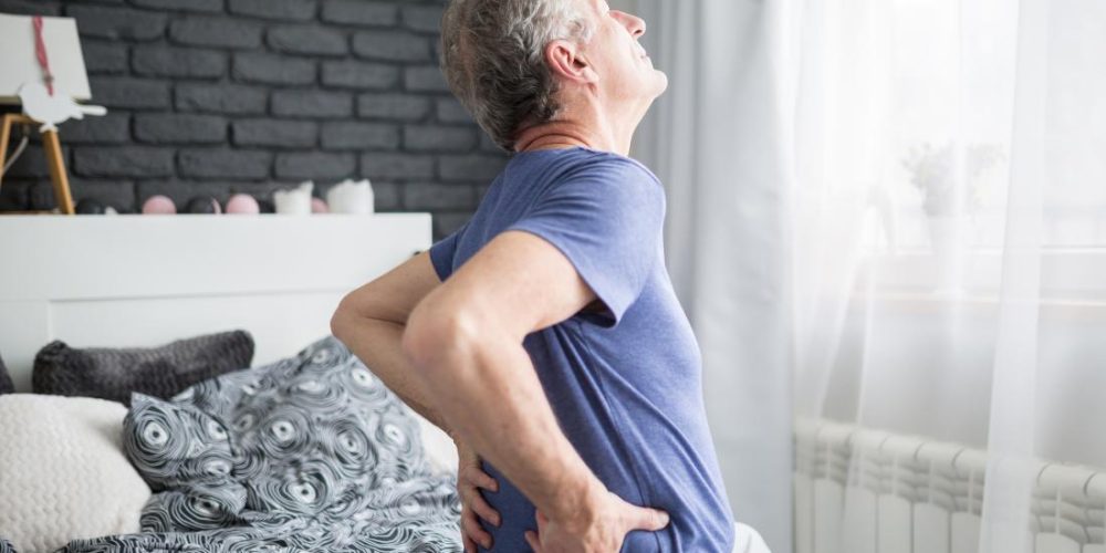 What can cause morning back pain?
