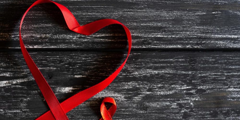 What chronic illnesses are people with HIV more likely to experience?