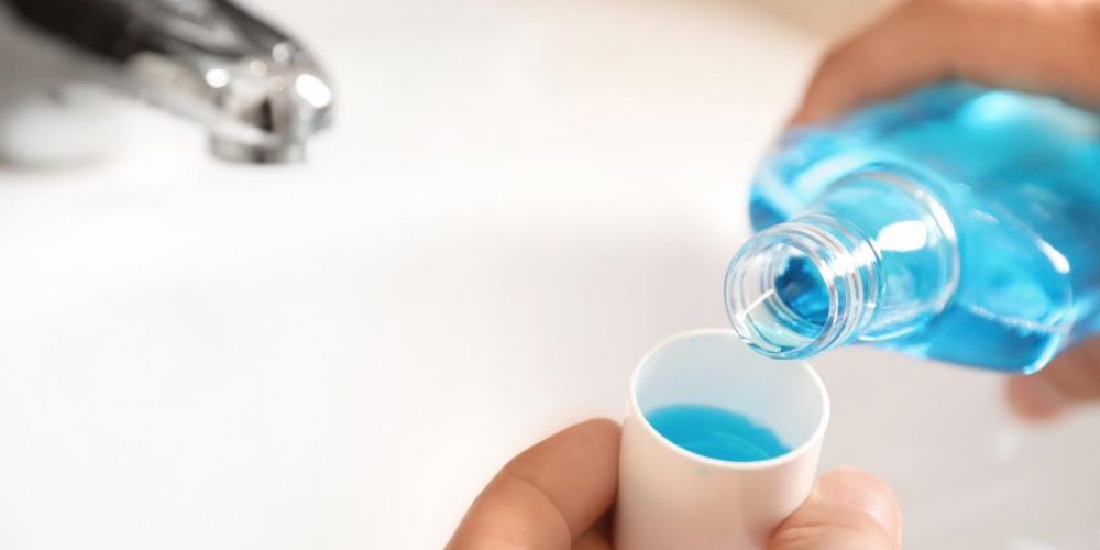 How can mouthwash interfere with the benefits of exercise?