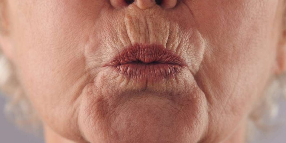 What is pursed lip breathing?