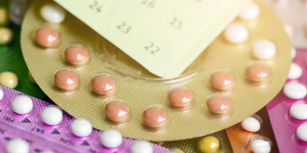 How do birth control pills affect menopause?