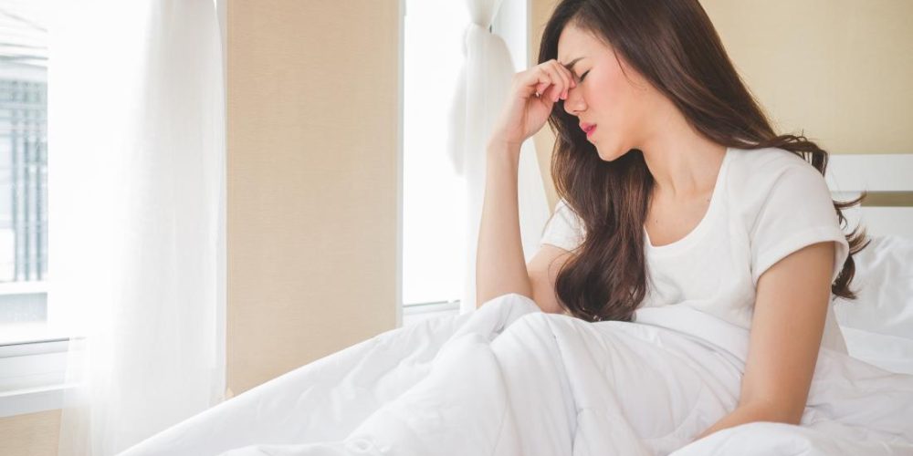 What can cause dizziness when waking up?
