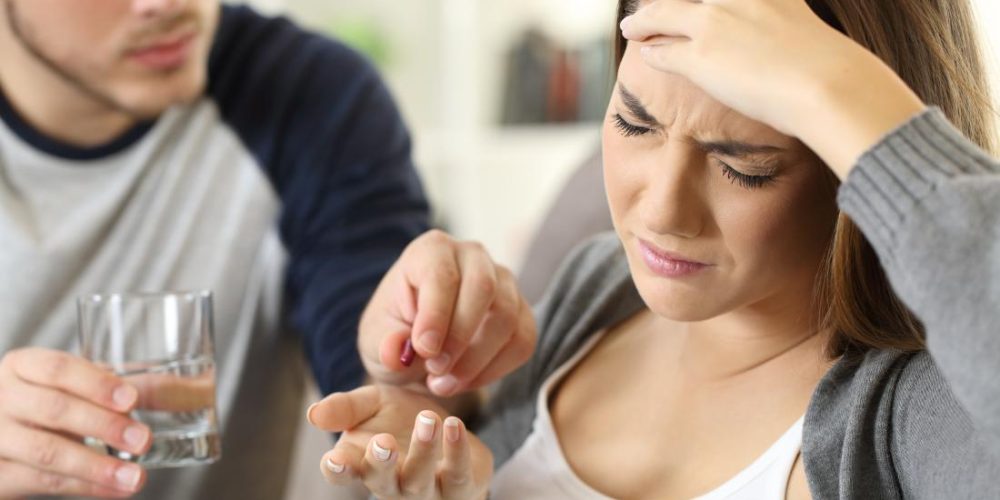 What causes a headache with nausea?